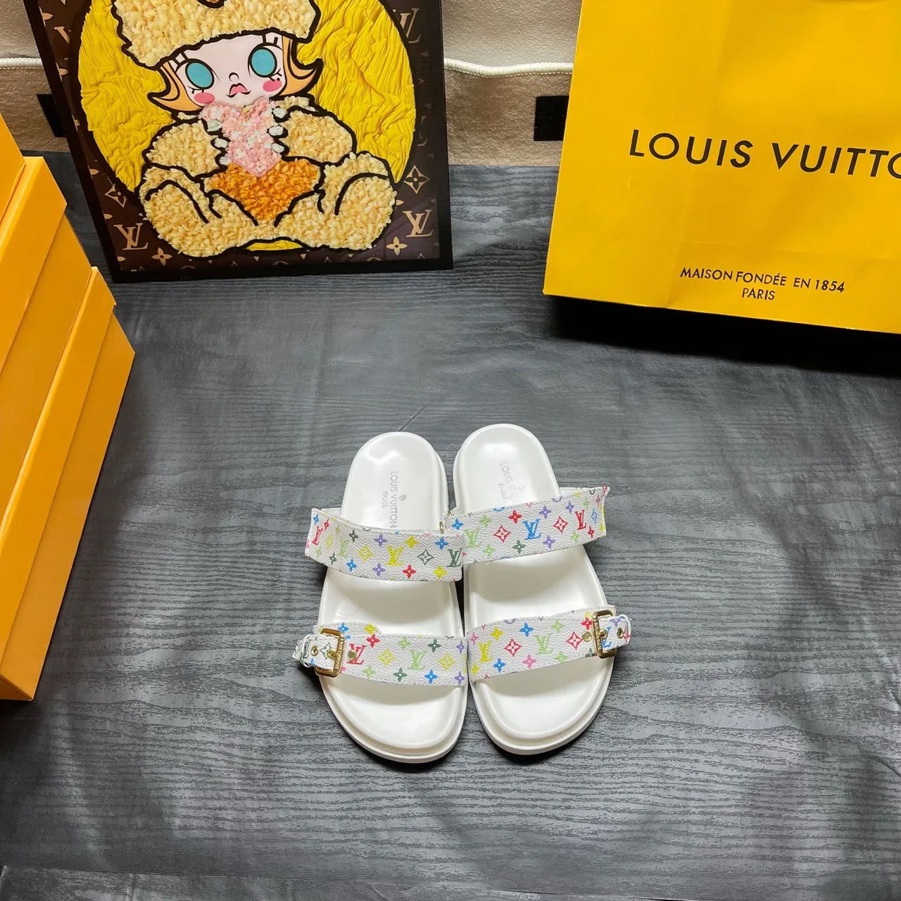Louis Vuitton Two-Strap Buckle Slides in Black / White / Brown / Blue · view 4