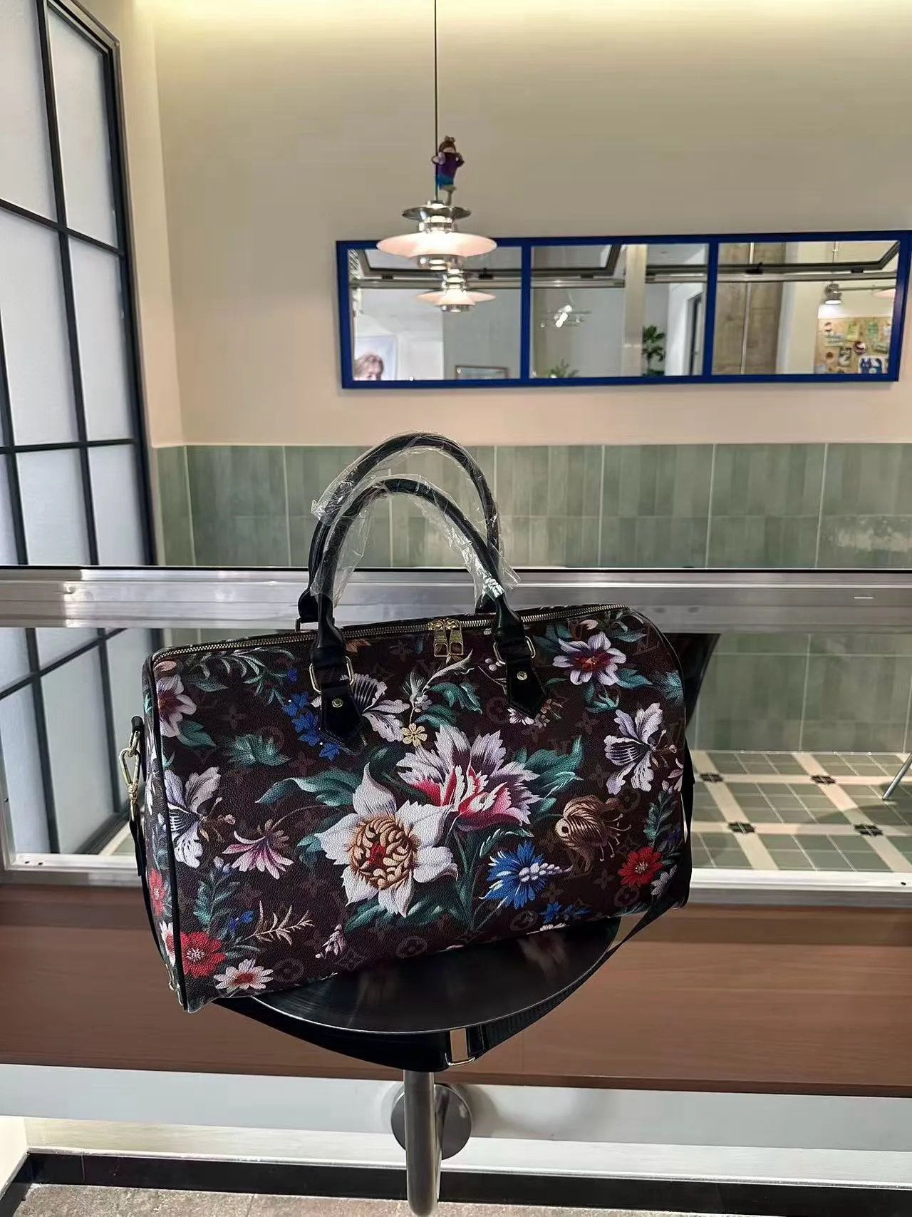 Louis Vuitton Floral Monogram Duffel Bag in Brown · view 8