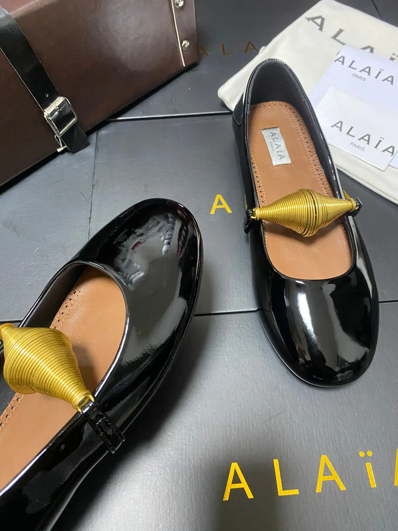 Alaia Cowhide Sheepskin Glossy Square-Toe Mary Jane Flats in Black · view 8