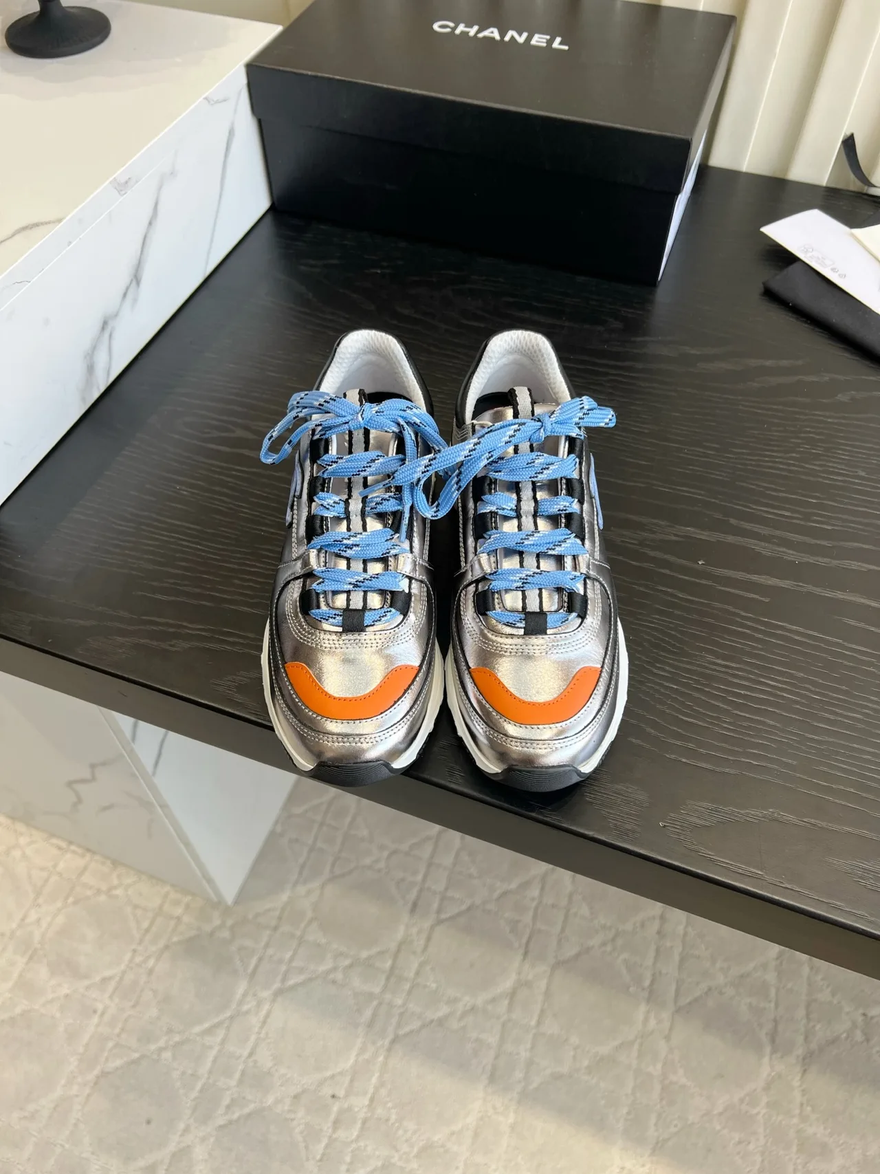 Chanel Sneakers in Silver · view 1