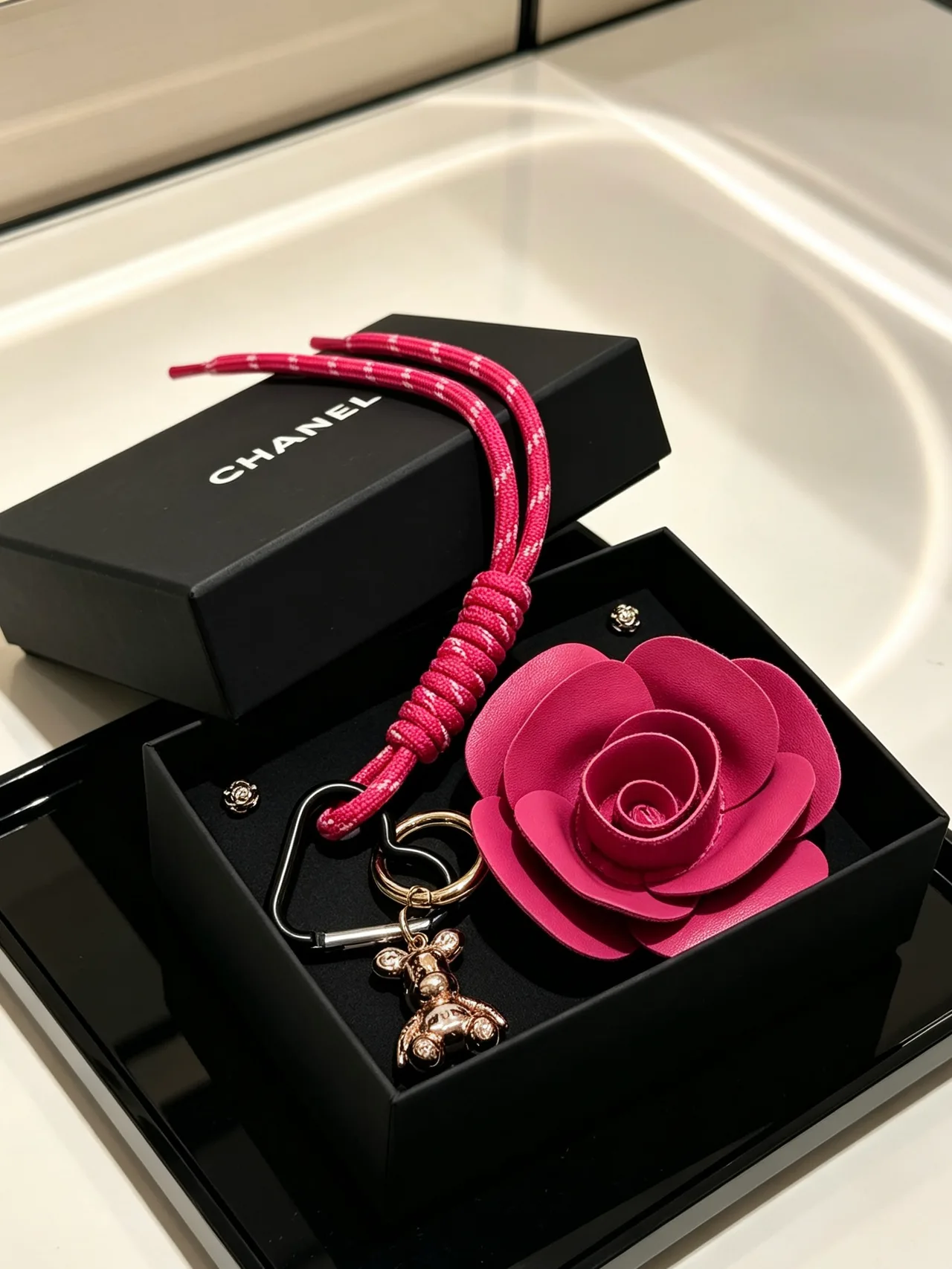 Chanel Woven Rose Keychain in Pink · view 3