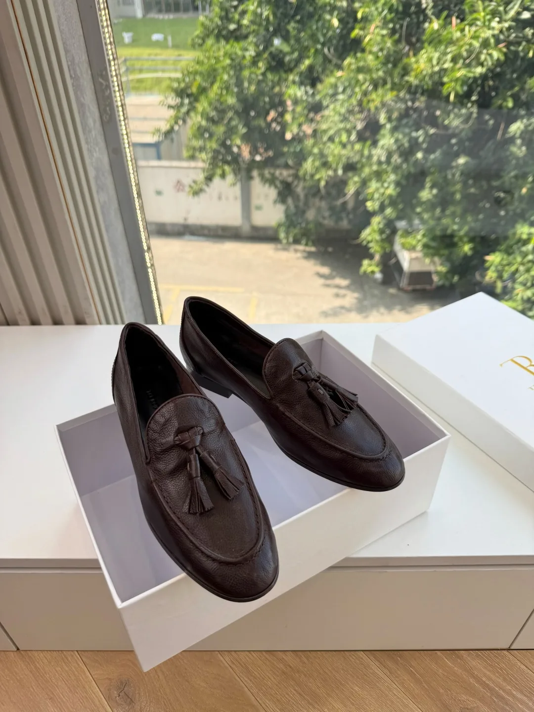 The Row Cowhide Glossy Round-Toe Tassel Loafers in Brown · view 2