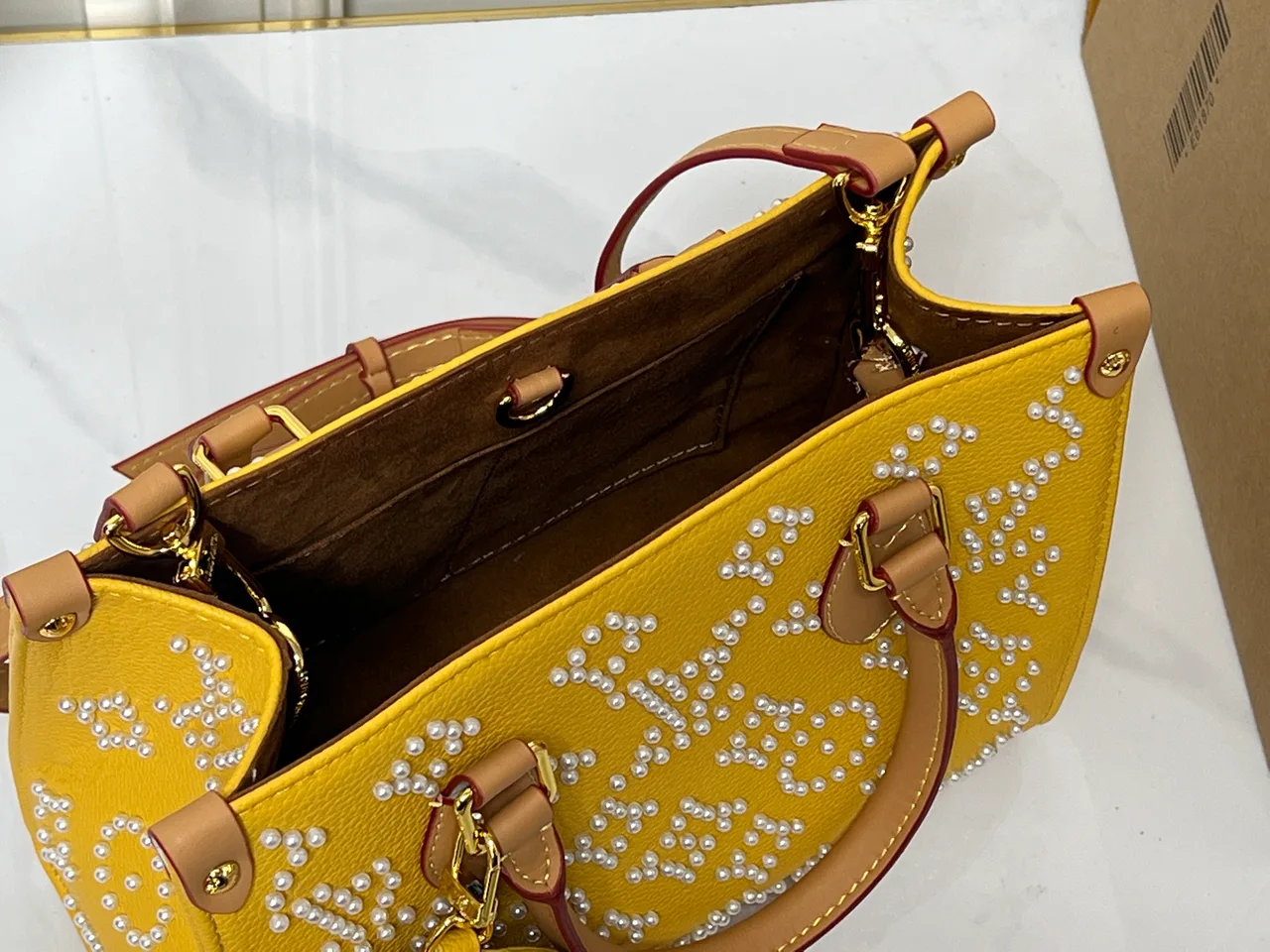 Louis Vuitton Cowhide OnTheGo Tote in Yellow · view 8