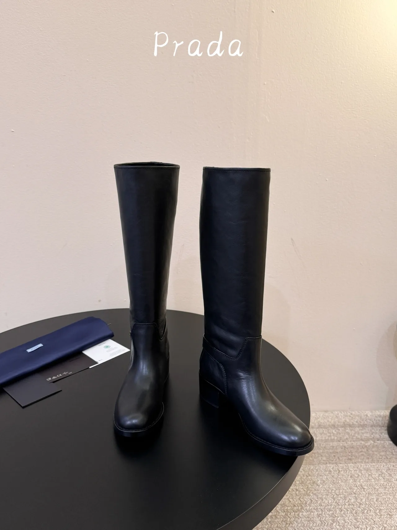 Prada Cowhide Glossy Pointed-Toe Knee-High Boots in Black · view 2