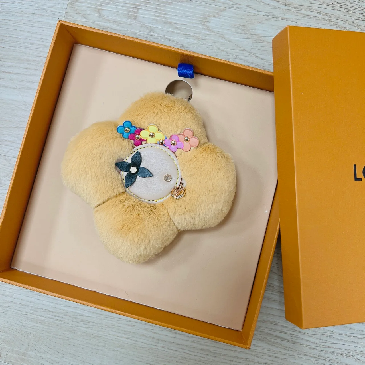 Louis Vuitton Faux-fur flower bag charm in Purple & White & Brown & Yellow & Red & Pink & Black & Blue & Cream · view 4