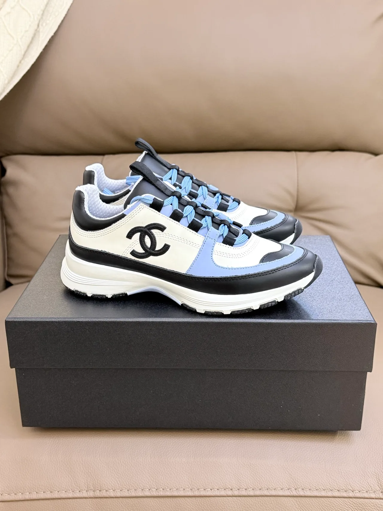 Chanel Cowhide Sheepskin Sneakers in White · view 4