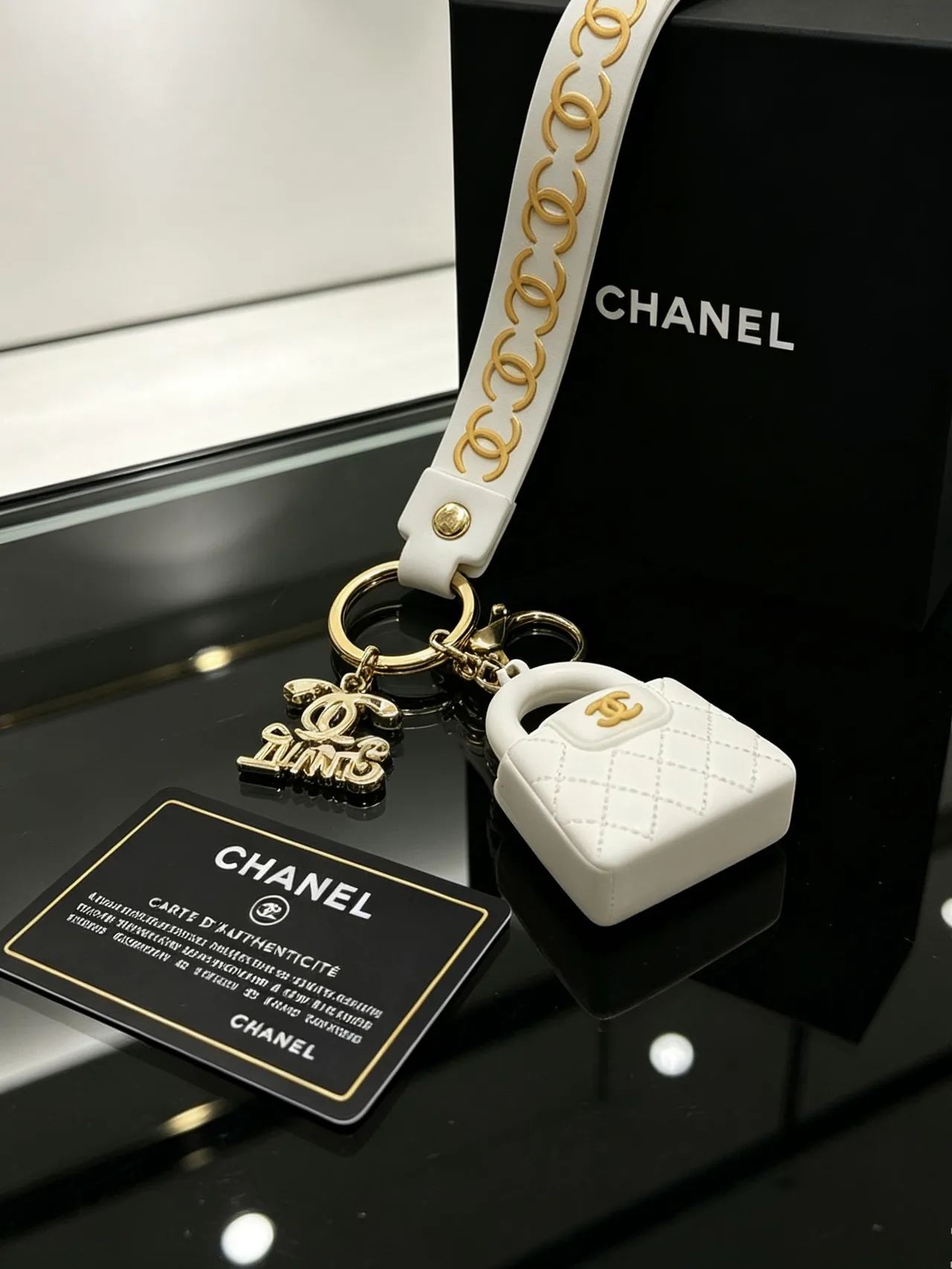 Chanel Quilted Mini Handbag Keychain in White · view 6