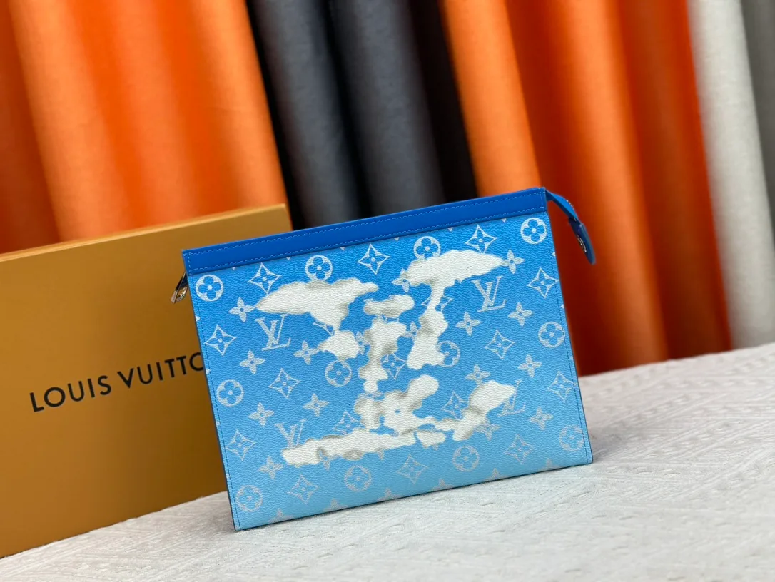Louis Vuitton Canvas Clutch in Blue · view 1