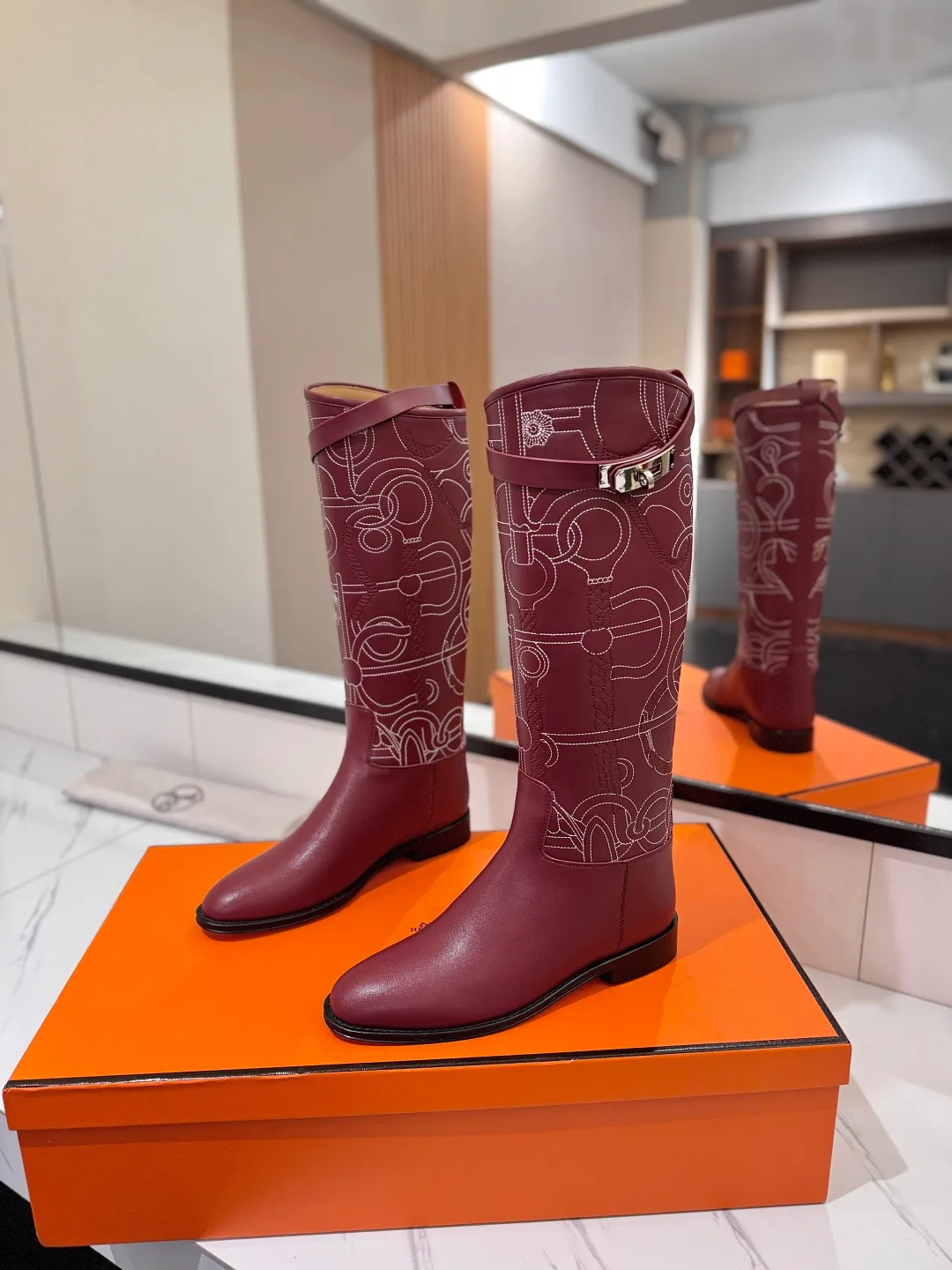 Hermes Cowhide Boots in Burgundy · view 2