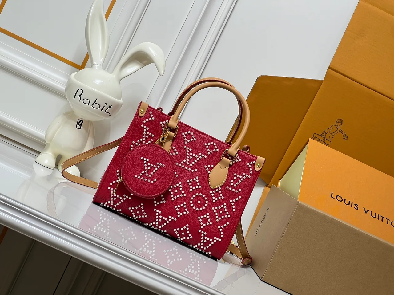Louis Vuitton Cowhide OnTheGo Tote in Red · view 1
