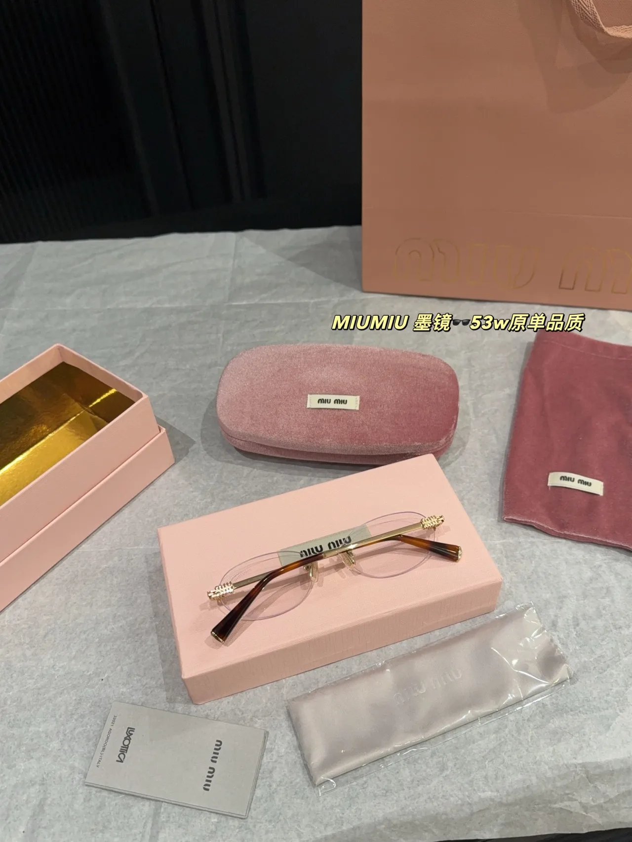 Miu Miu Rimless Glasses in Gold · view 1
