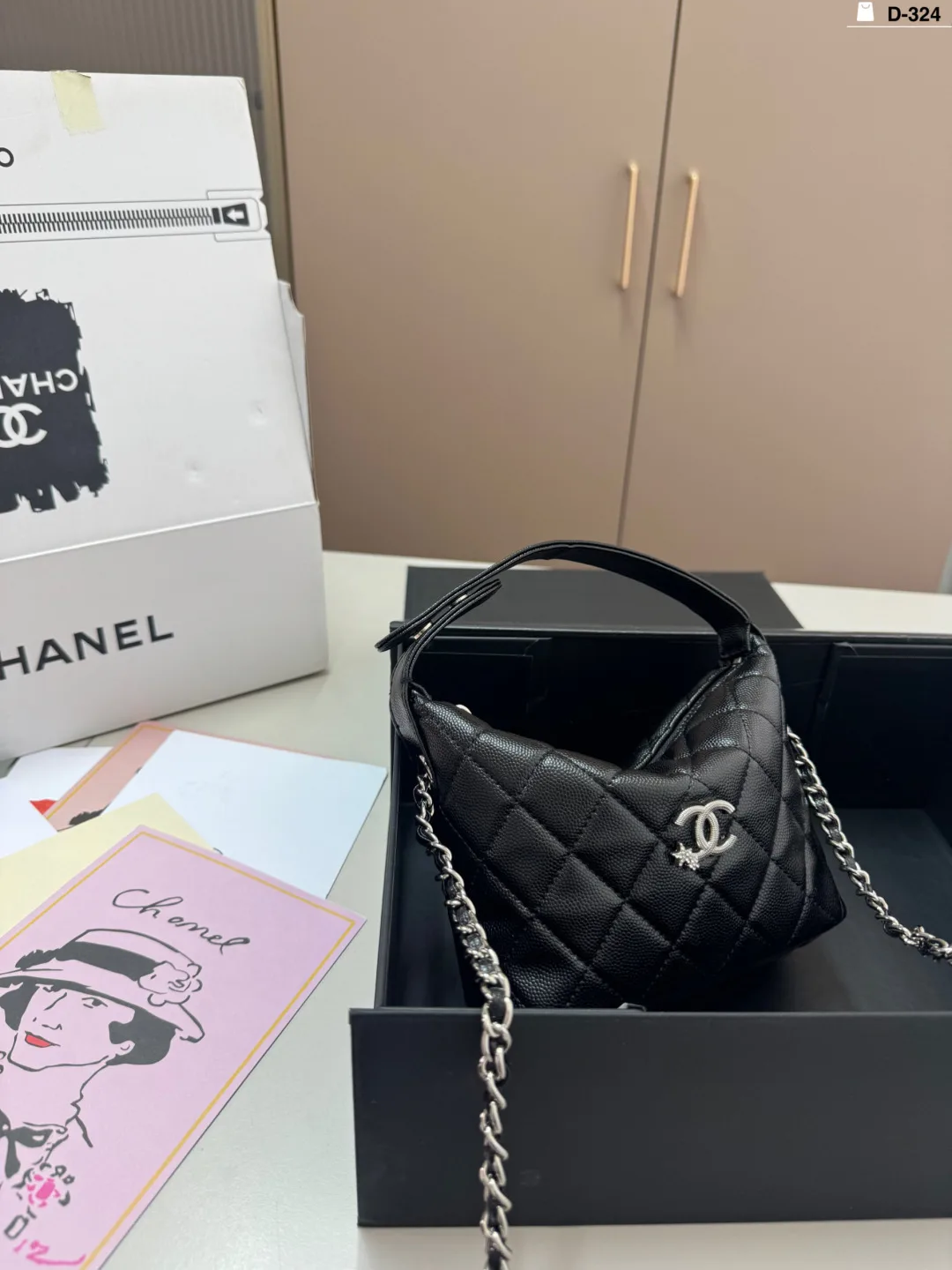 Chanel Quilted Bucket Bag in Black · view 1
