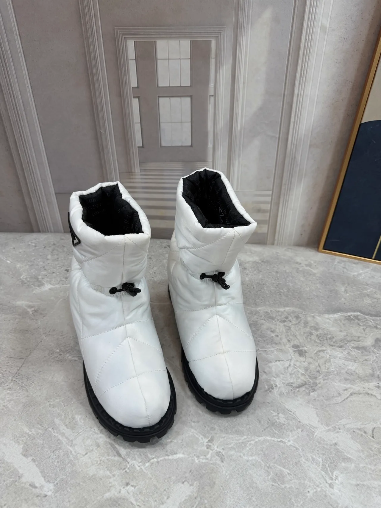 Prada Quilted Glossy Puffer Boots in White · view 1