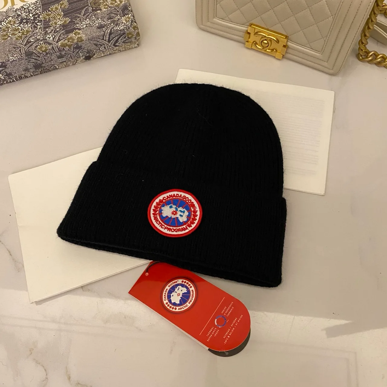 Canada Goose Ribbed beanie in Blue & White & Red & Grey & Black & Cream & Pink & Yellow & Orange & Brown · view 5