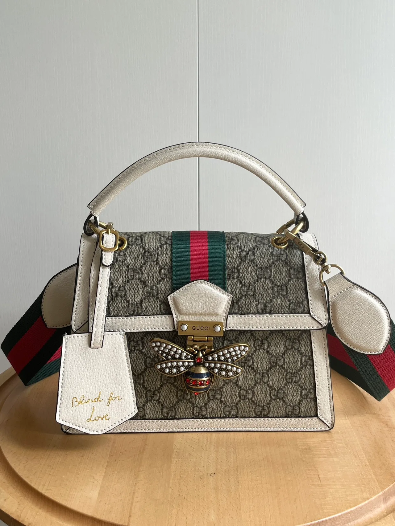 Gucci Striped Top-Handle Bag in Beige · view 1