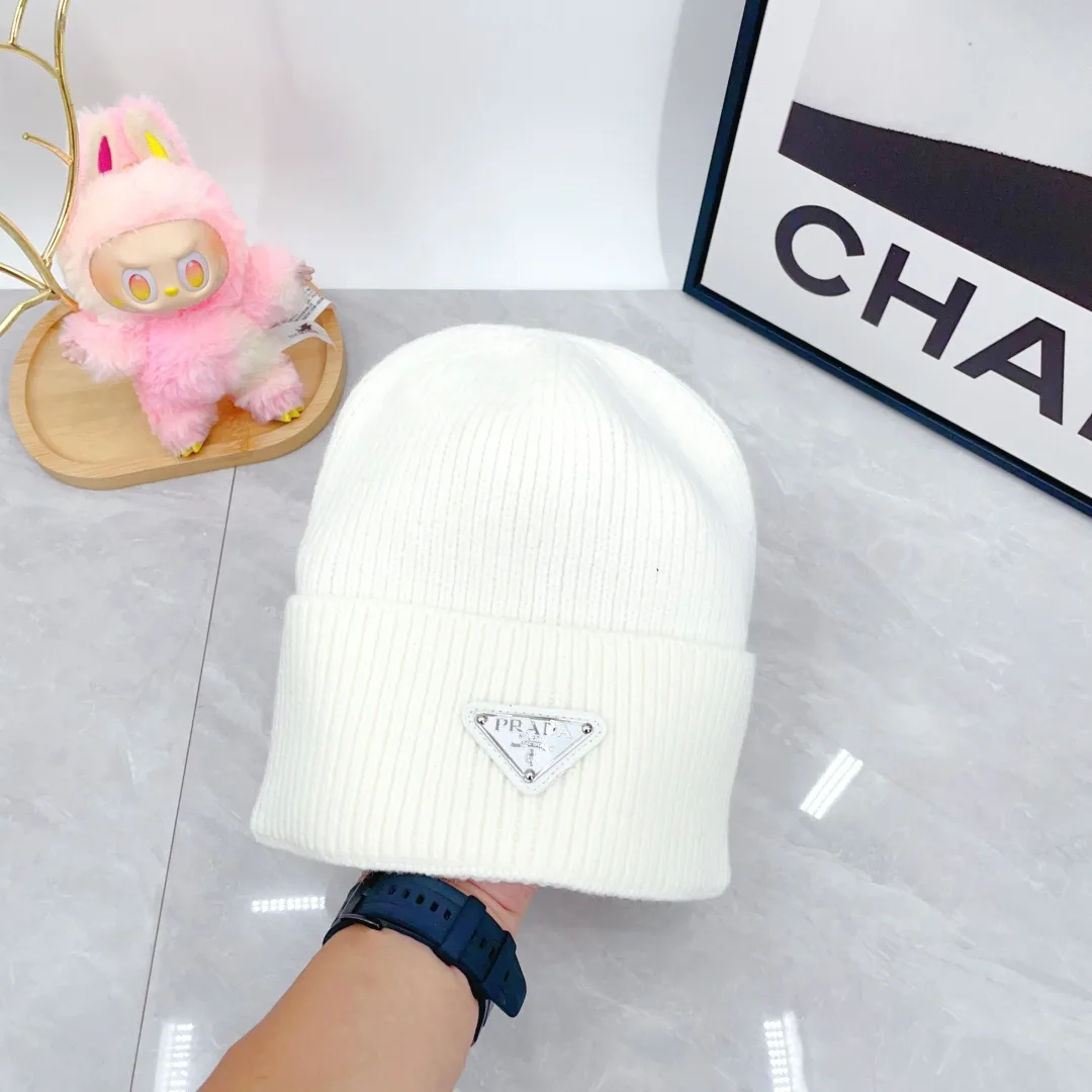 Prada Wool Triangle Logo Knit Beanie in White · view 1