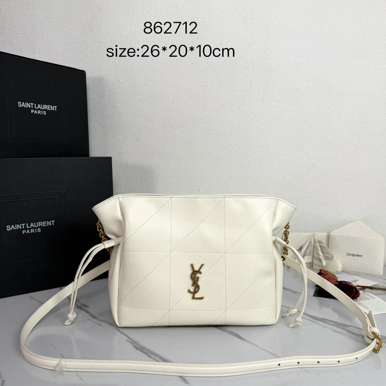 Saint Laurent Quilted Crossbody Bag in White · view 1