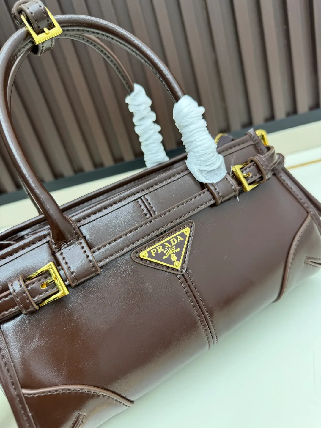 Prada Calfskin Buckle-Detail Structured Top-Handle Bag in Brown · view 4