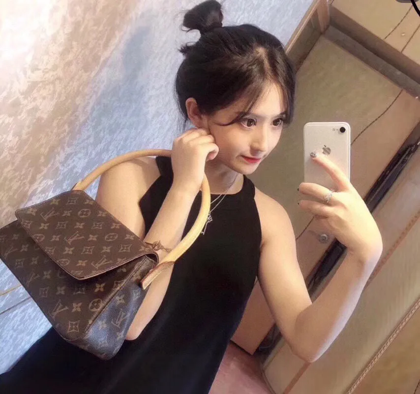 Louis Vuitton Shoulder Bag in Brown · view 1