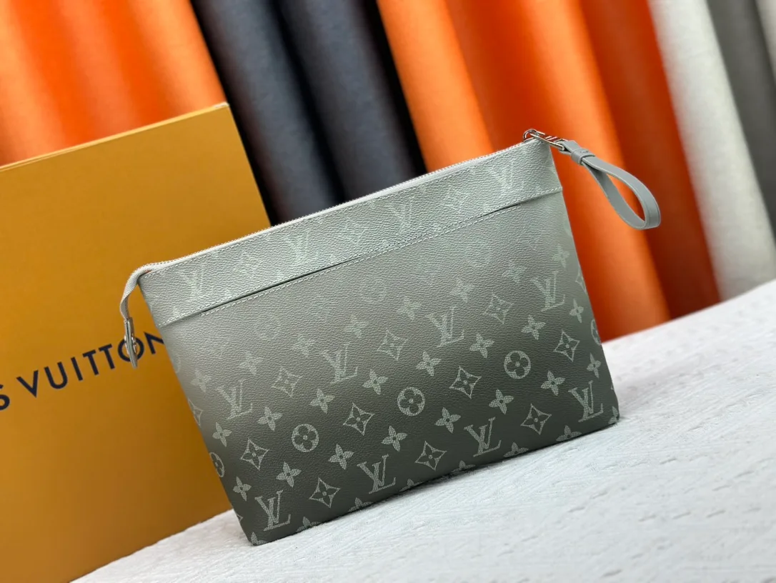 Louis Vuitton Leather Clutch in Grey · view 1