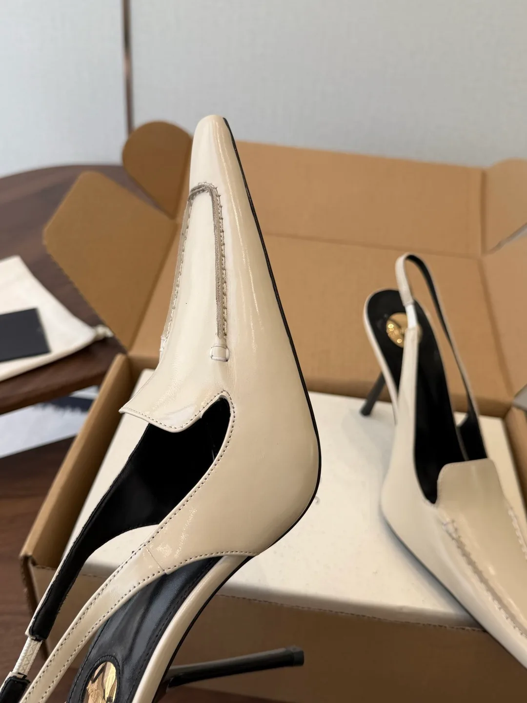 Saint Laurent Cowhide Pointed-Toe Slingback Shoes in Cream · view 6