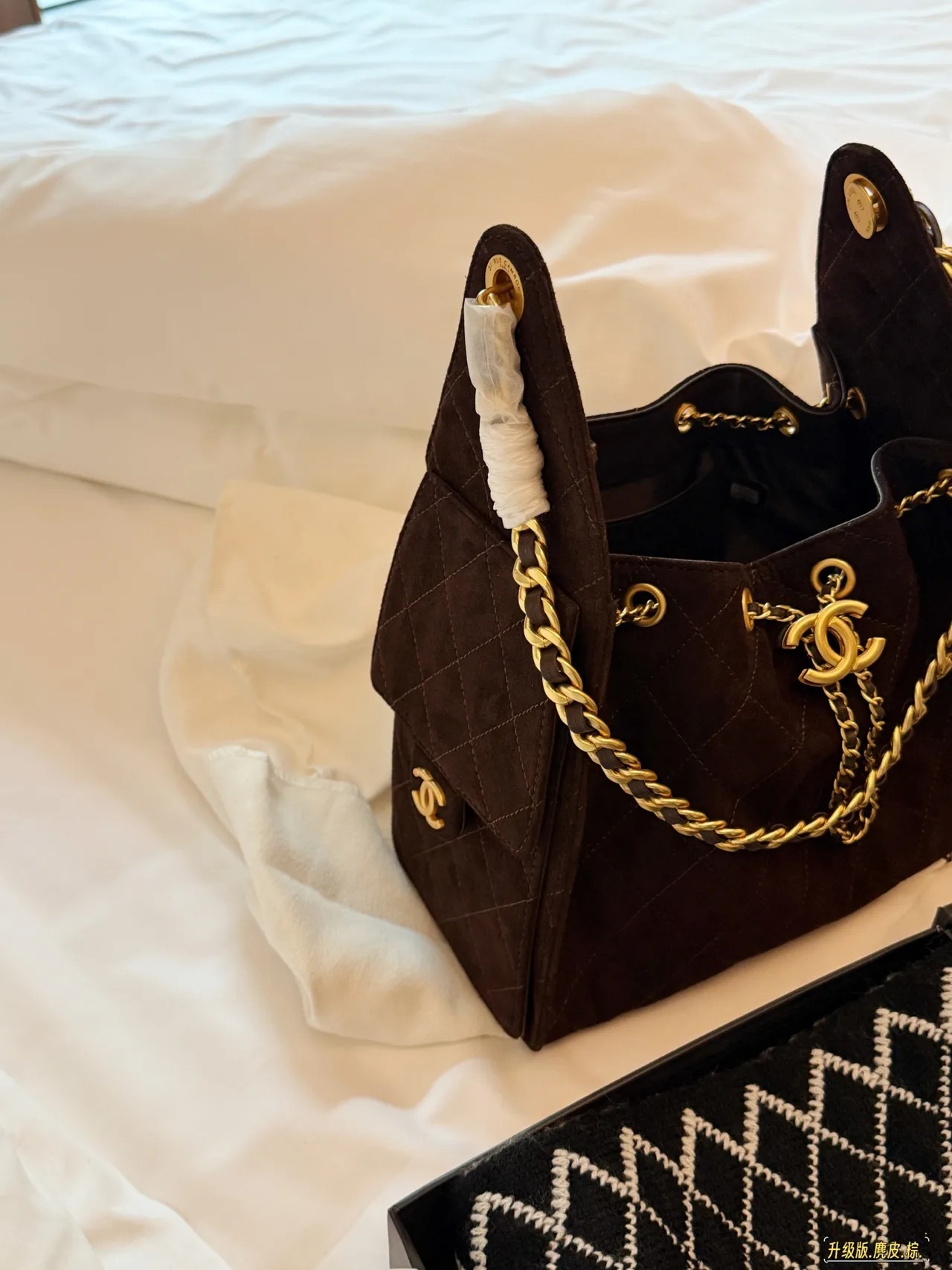 Chanel Quilted Bucket Bag in Brown · view 1
