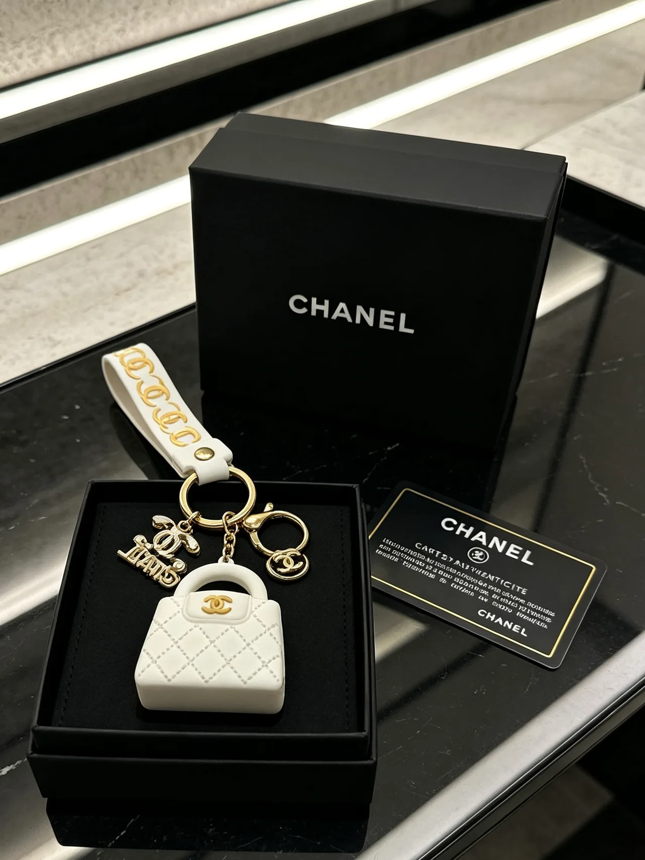 Chanel Quilted Mini Handbag Keychain in White · view 3