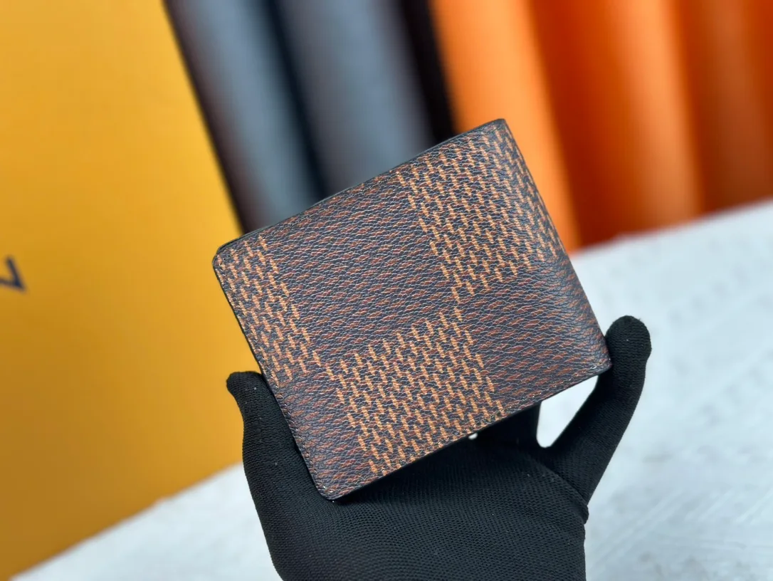 Louis Vuitton Calfskin Bifold Wallet in Brown · view 3