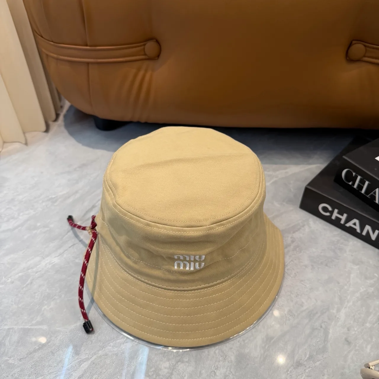 Miu Miu Bucket Hat in Beige · view 4