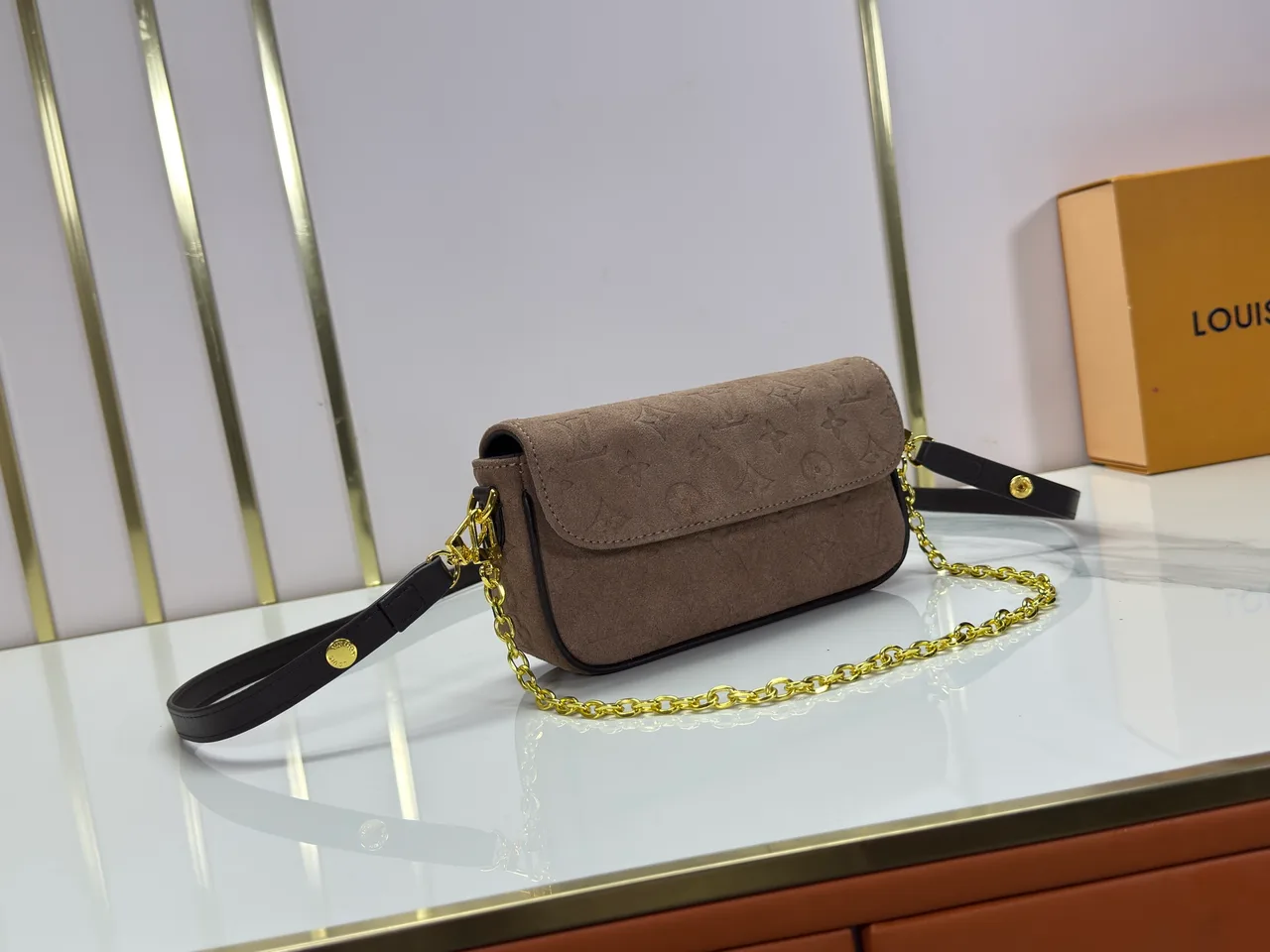 Louis Vuitton Leather Suede-Look Handbag in Brown · view 2
