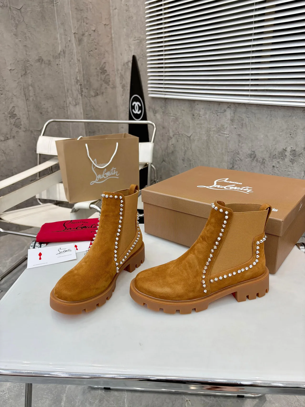 Christian Louboutin Stud-trim ankle boots in Black & Tan · view 4