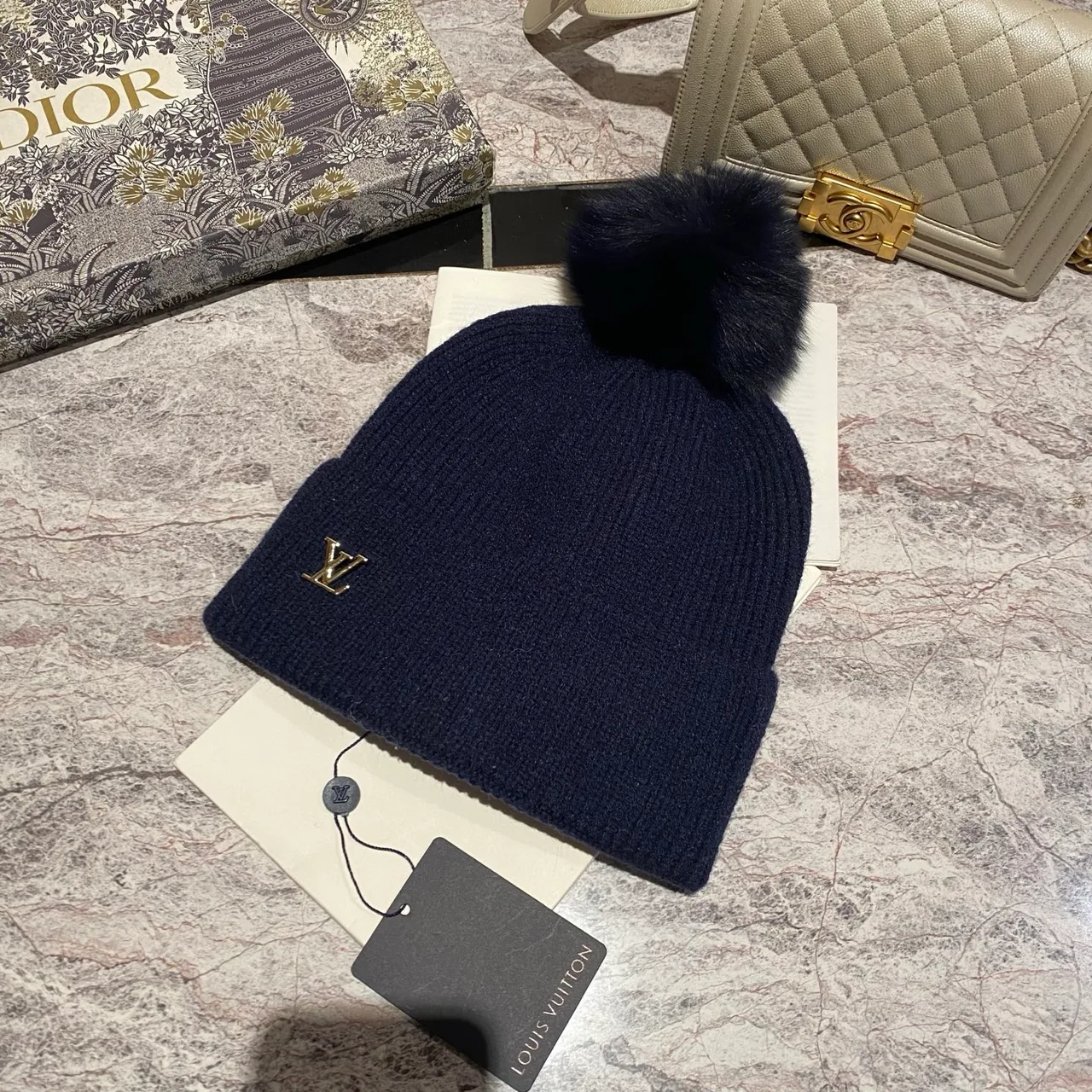Louis Vuitton Pom-Pom Beanie in Black & White & Blue & Pink & Beige & Grey & Cream & Burgundy & Red & Tan · view 3