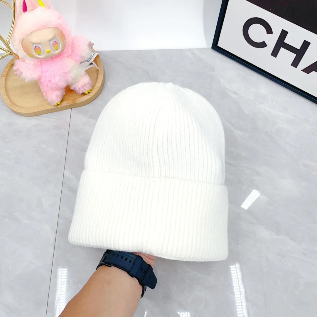 Prada Wool Triangle Logo Knit Beanie in White · view 6