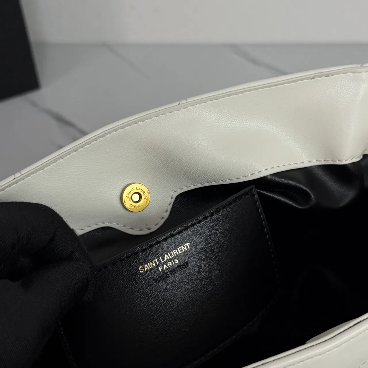 Saint Laurent Quilted Crossbody Bag in White · view 6