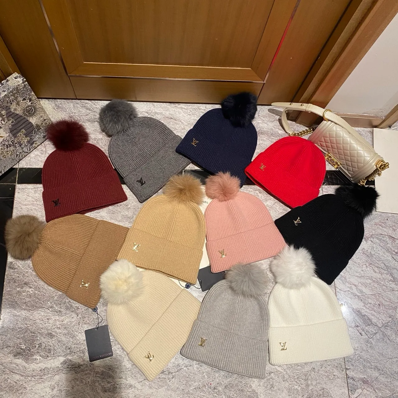 Louis Vuitton Pom-Pom Beanie in Black & White & Blue & Pink & Beige & Grey & Cream & Burgundy & Red & Tan · view 8