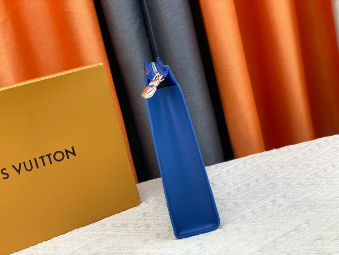Louis Vuitton Cowhide Canvas Clutch in Blue · view 5
