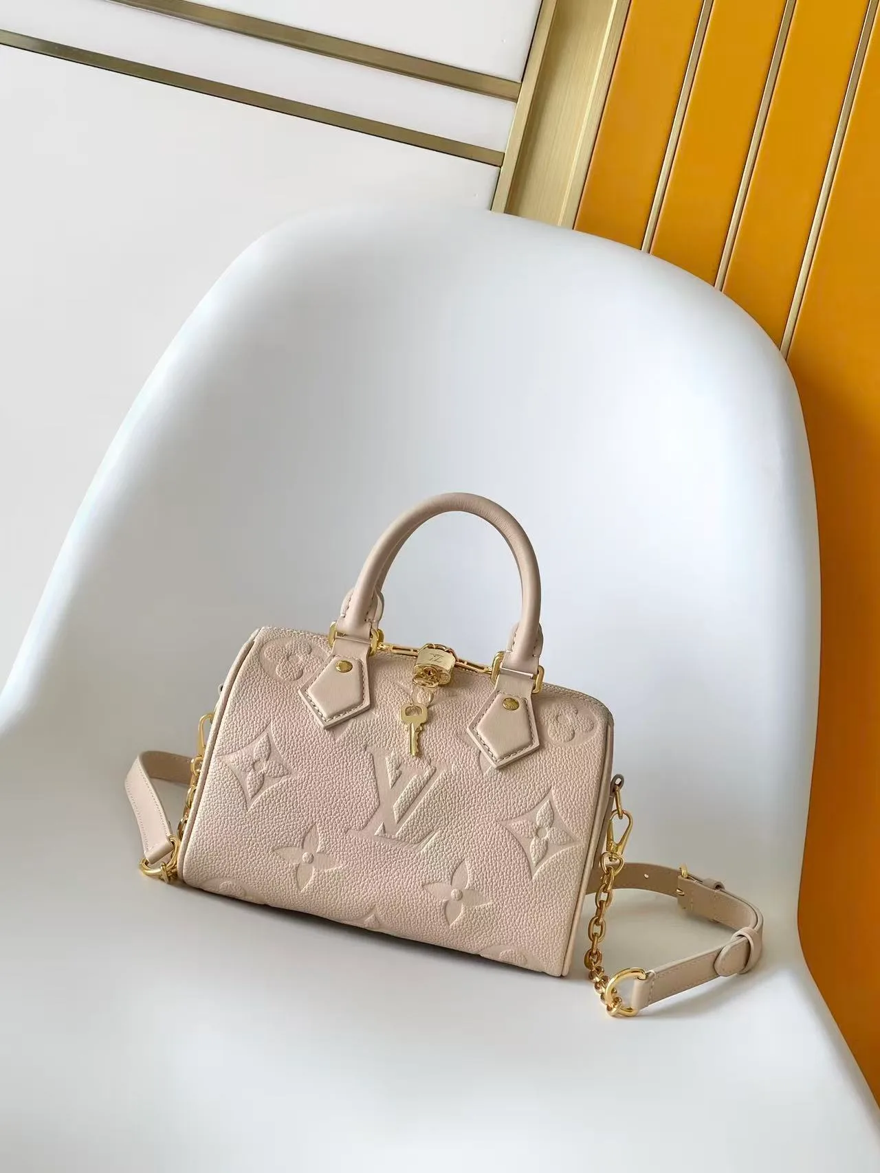 Louis Vuitton Speedy Cowhide Smooth Crossbody Bag in Beige · view 1