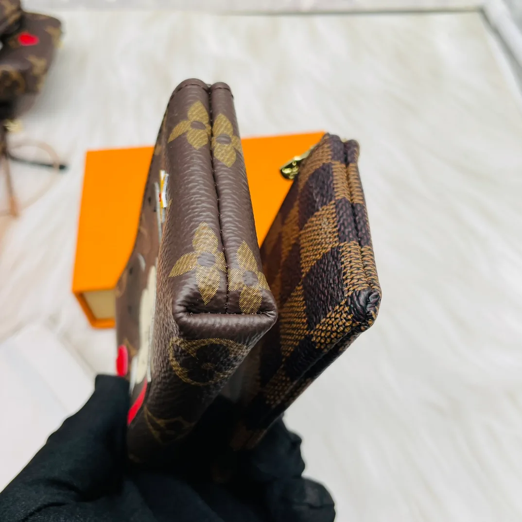 Louis Vuitton Cartoon Zip Pouch Keychain in Brown · view 2