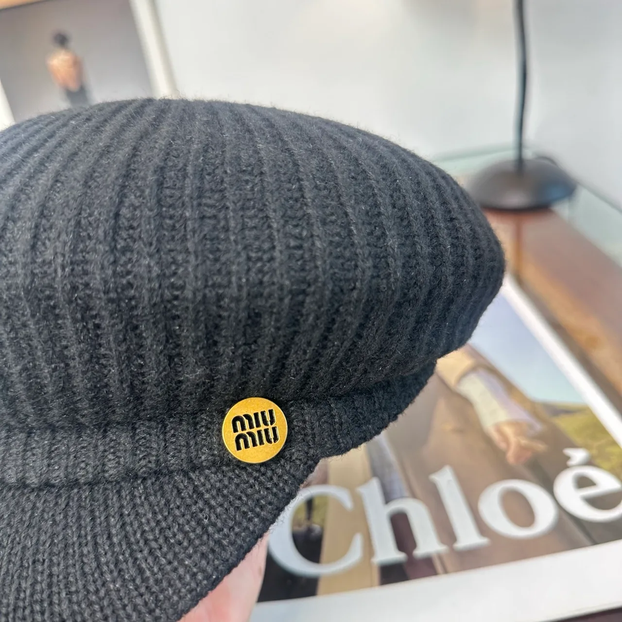 Miu Miu Ribbed Newsboy Cap in Black · view 7