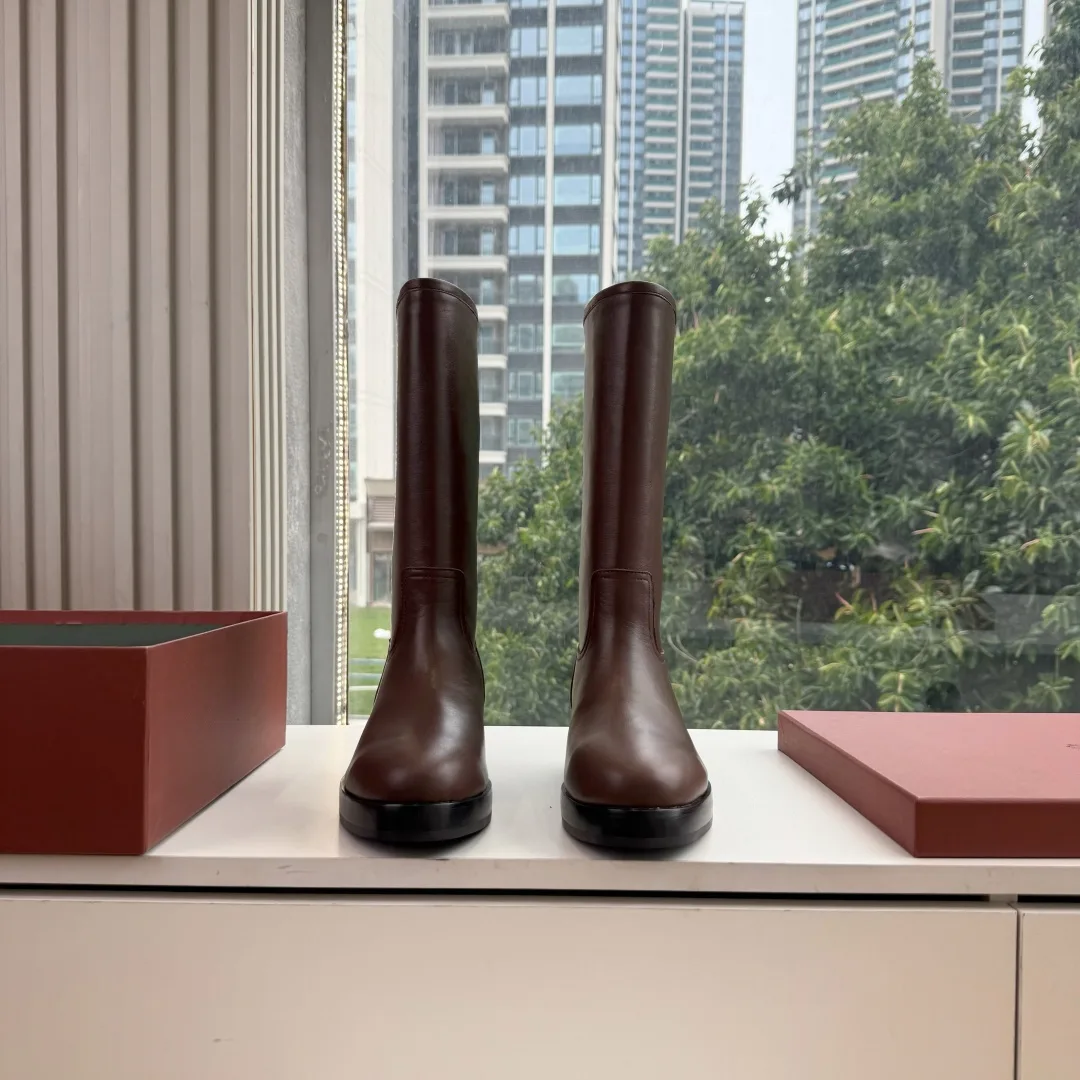 Loro Piana Cowhide Glossy Round-Toe Ankle Boots in Brown · view 1
