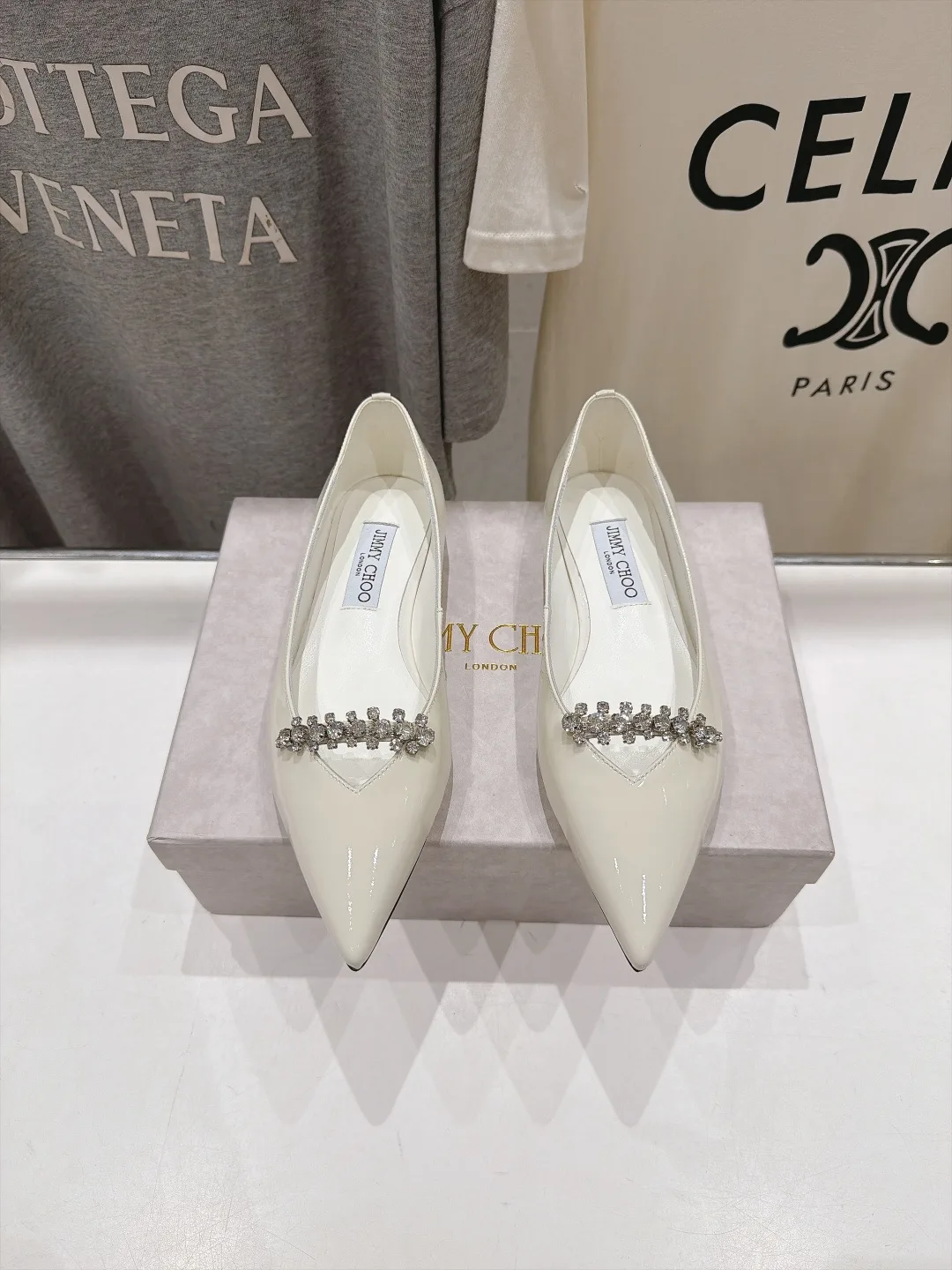Jimmy Choo Cowhide Glossy Pointed-Toe Flats in White · view 1