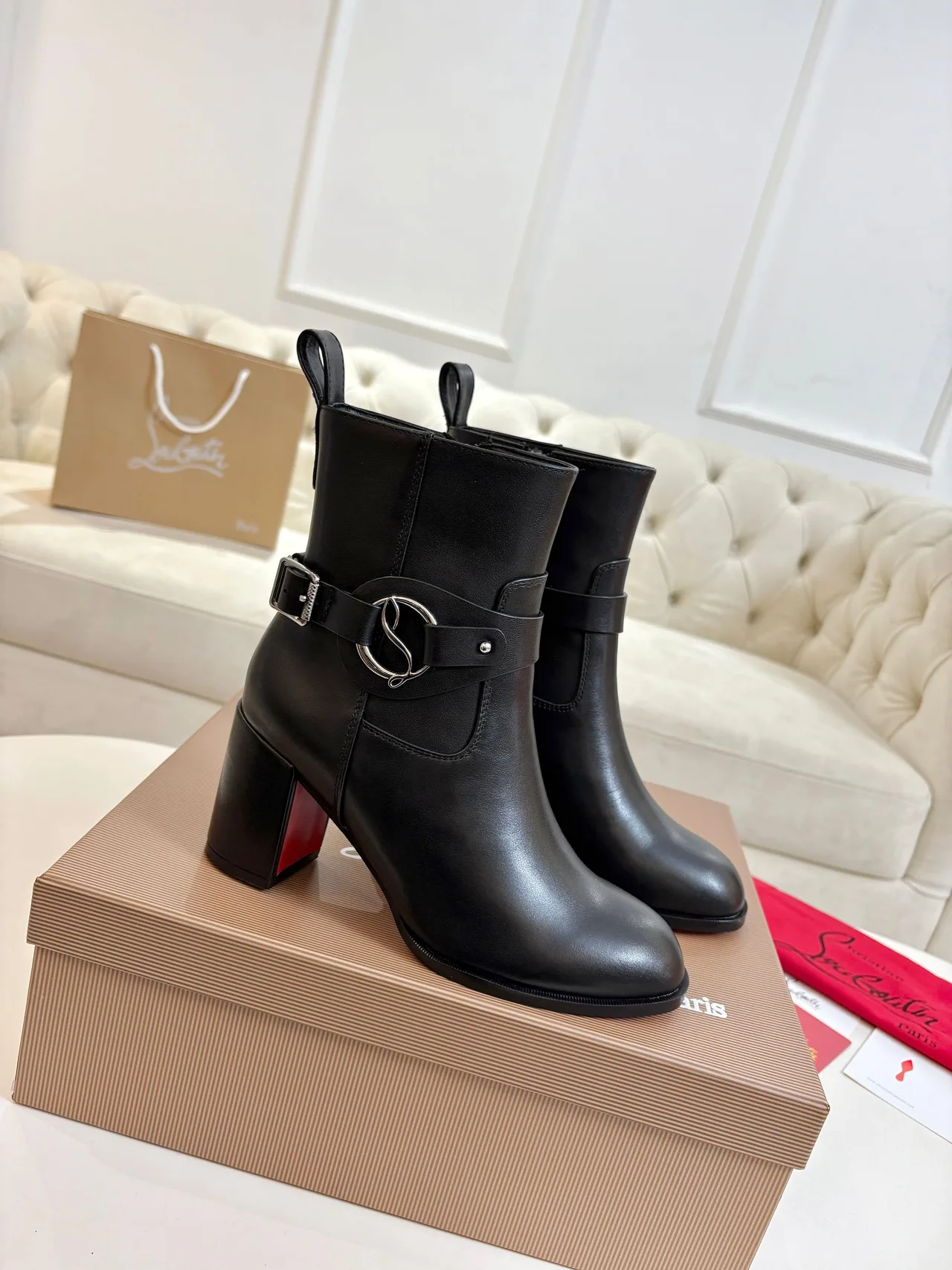 Christian Louboutin Calfskin Glossy Buckle Ankle Boots in Black · view 1