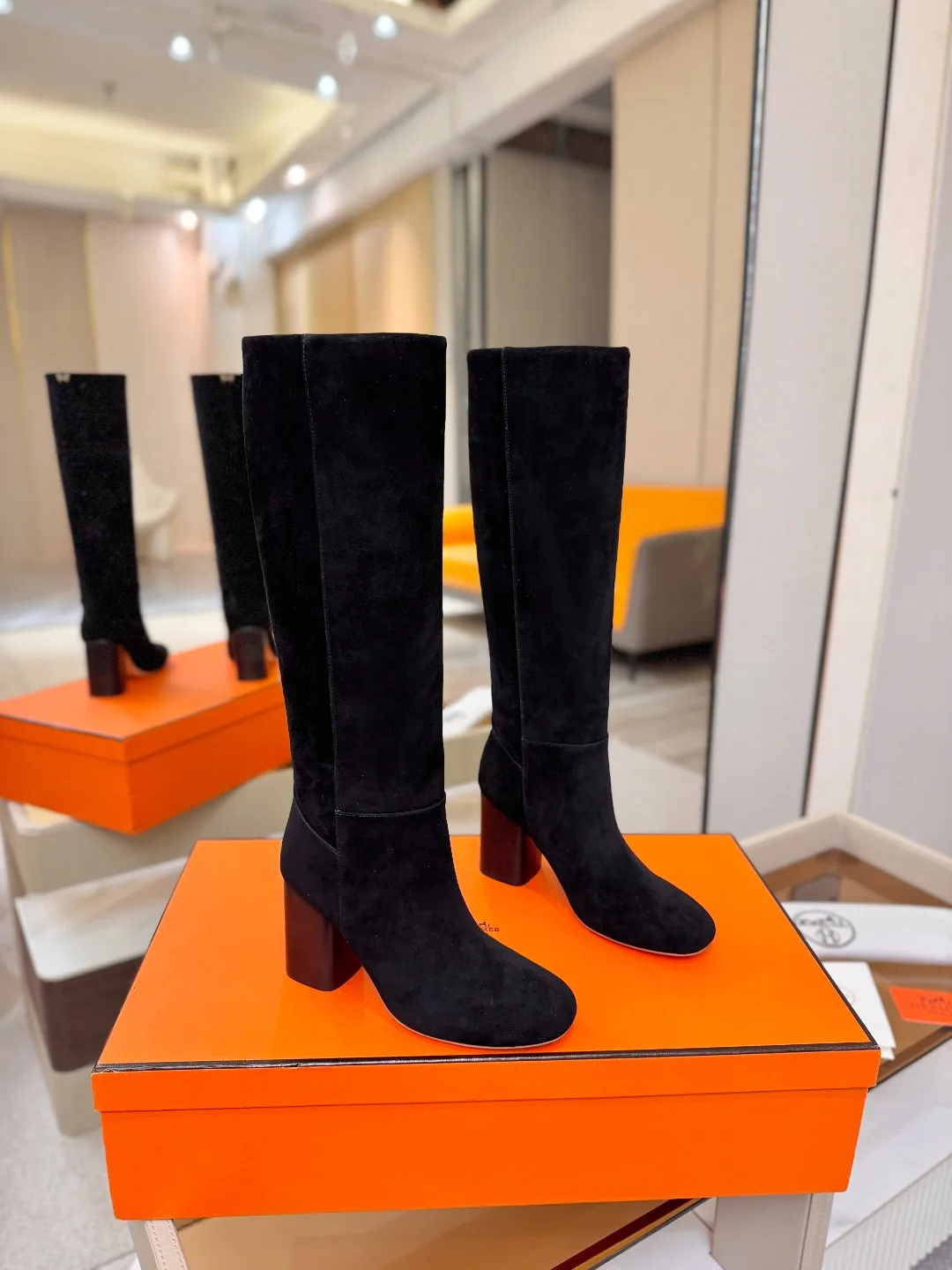 Saint Laurent Cowhide Knee-High Boots in Black · view 2