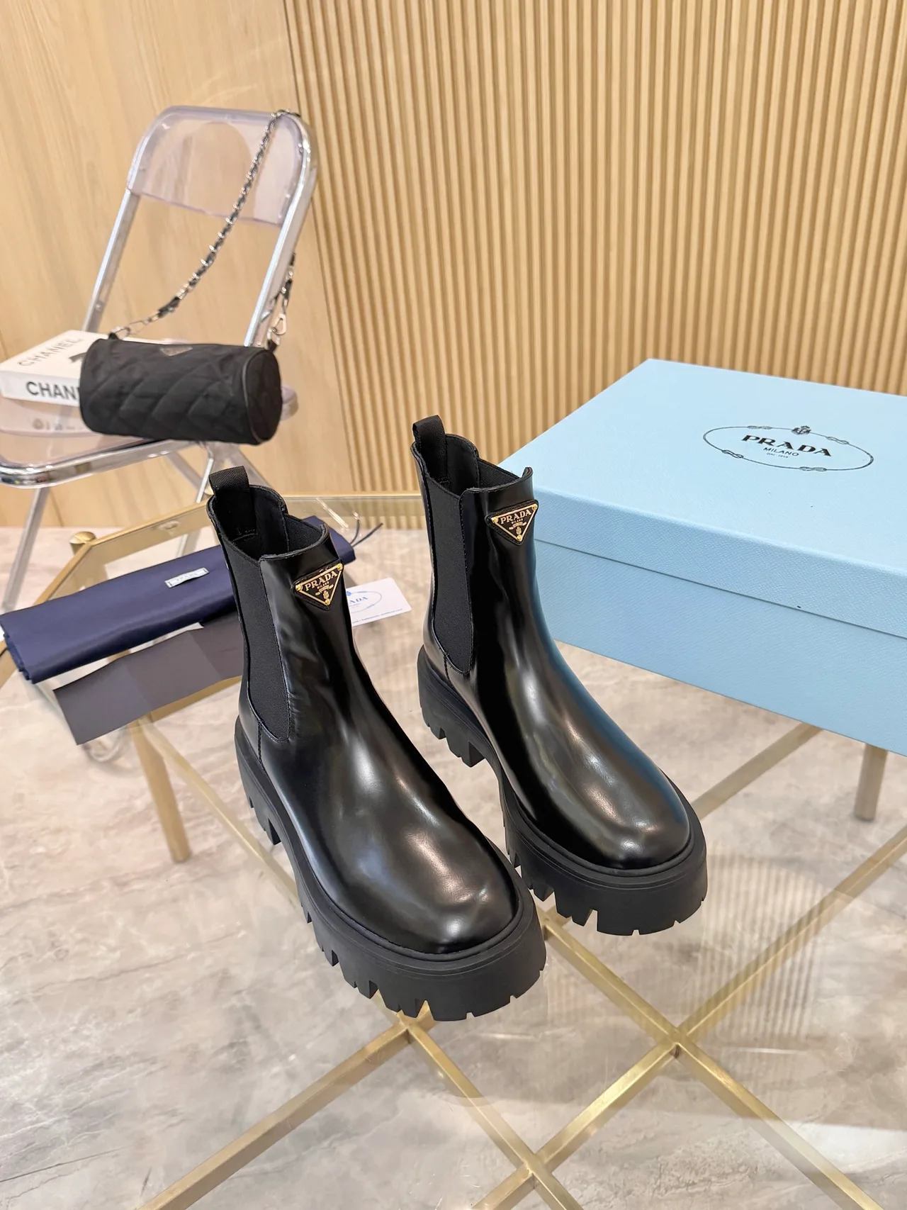 Prada Glossy Chelsea Boots in Black · view 1