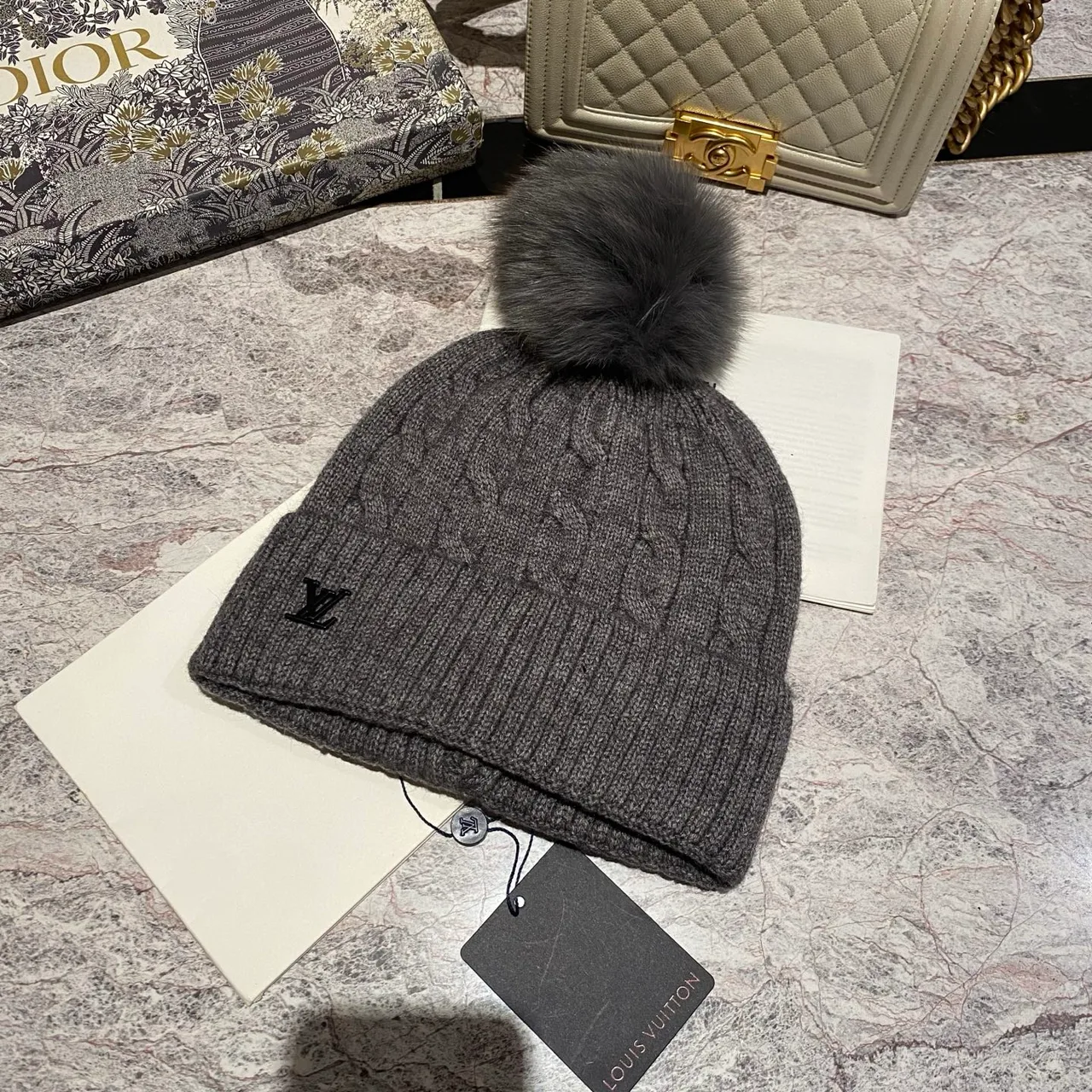 Louis Vuitton Cable knit pom beanie in Black & White & Blue & Burgundy & Cream & Grey & Brown & Pink · view 7