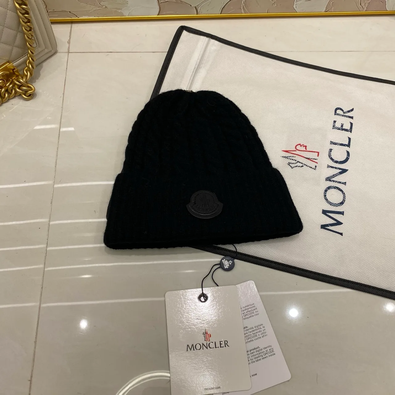 Moncler Cable Beanie in Black & White & Brown & Beige & Grey & Burgundy · view 1