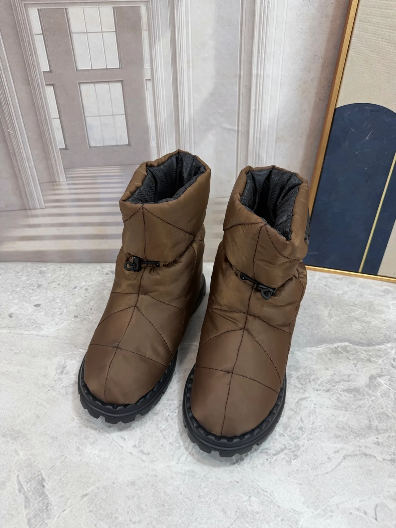 Prada Quilted Round-Toe Puffer Boots in Brown · view 5