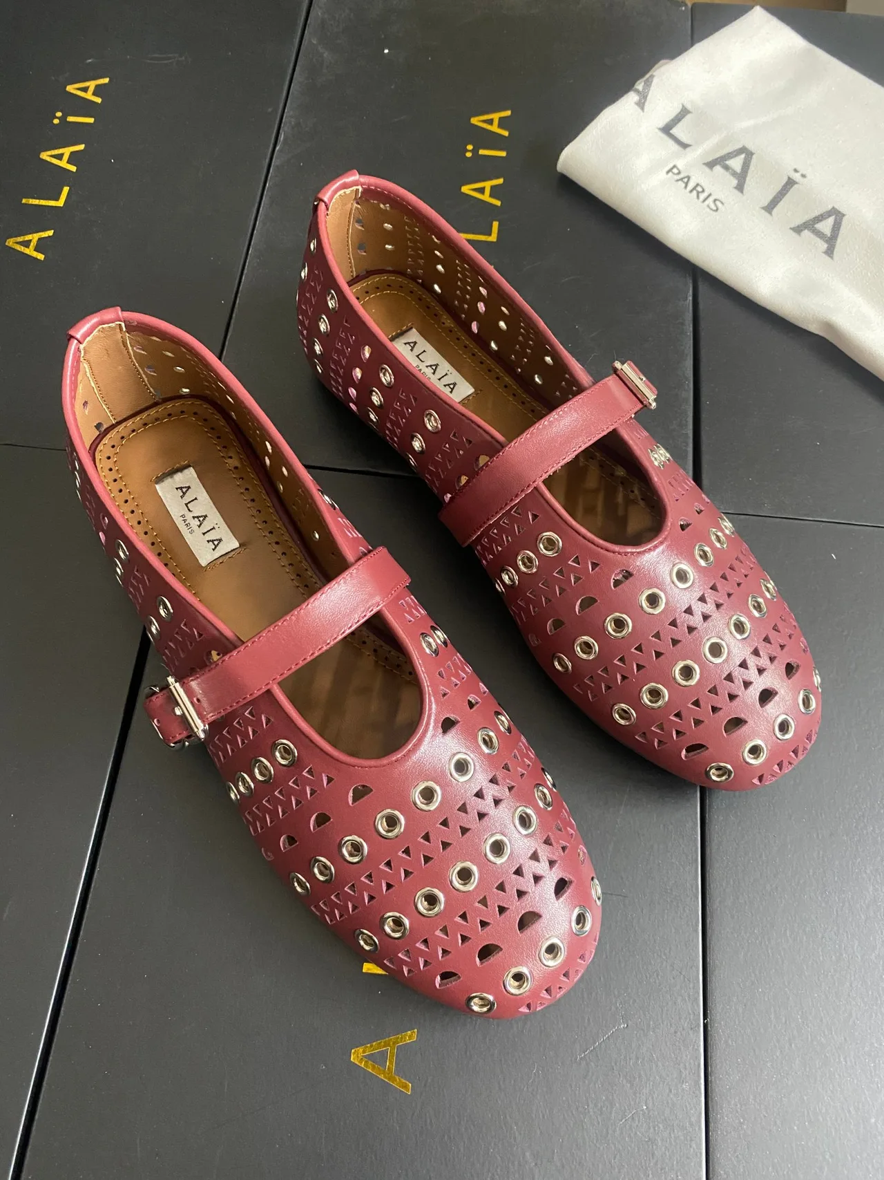 Alaia Cowhide Sheepskin Studded Mary Jane Flats in Burgundy · view 3