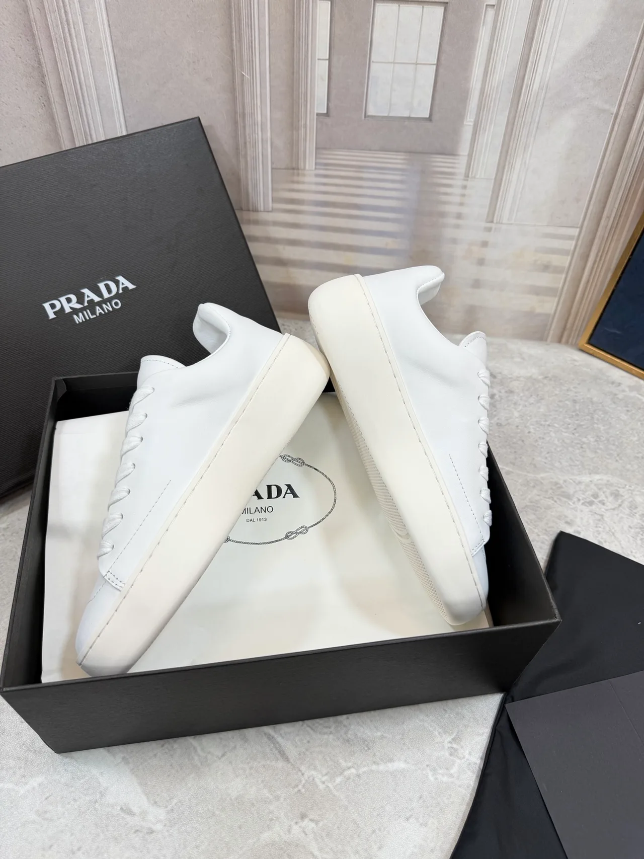 Prada Cowhide Smooth Low-Top Sneakers in White · view 7