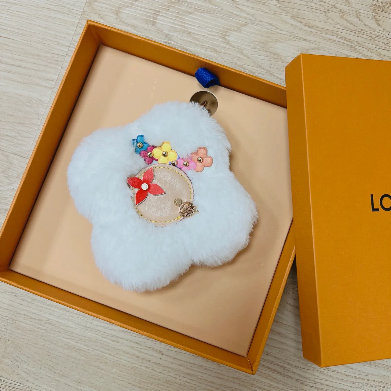 Louis Vuitton Faux-fur flower bag charm in Purple & White & Brown & Yellow & Red & Pink & Black & Blue & Cream · view 2